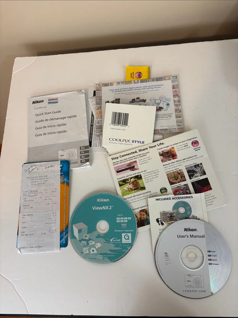 Nikon Coolpix S3100 camera with charger box and everything shown